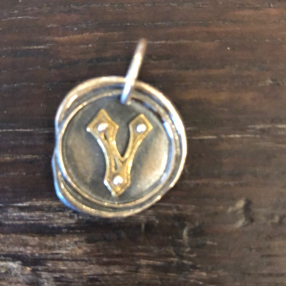 Letter “V” Rivet Insignia Charm Waxing Poetic